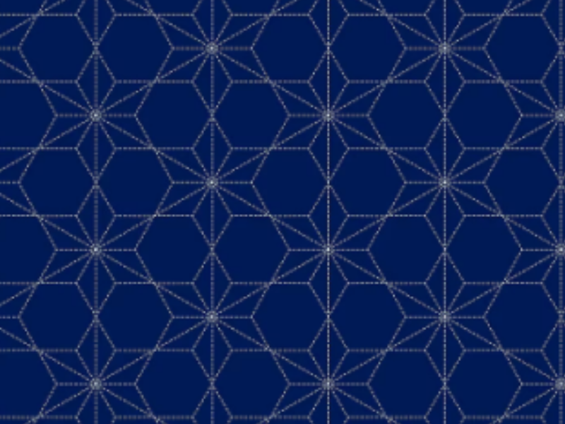 patrón simétrico de sashiko en hilo blanco sobre tela azul
