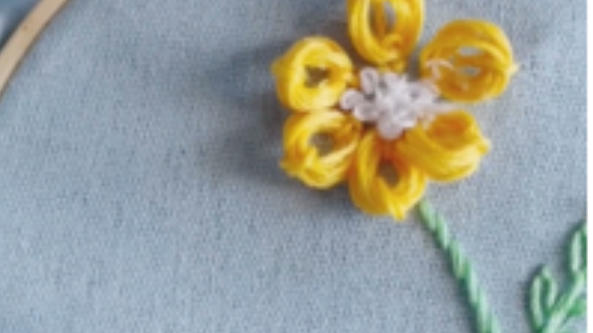 Embroidered flower in relief